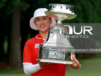 Amy Yang of Republic of Korea holds the winner's trophy during the awards ceremony after winning the KPMG Women's PGA Championship at Sahale...