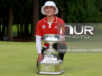 Amy Yang of Republic of Korea holds the winner's trophy during the awards ceremony after winning the KPMG Women's PGA Championship at Sahale...