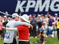 Amy Yang of Republic of Korea hugs her caddie after winning the KPMG Women's PGA Championship at Sahalee Country Club in Sammamish, Washingt...