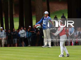 Miyu Yamashita of Japan follows her shot toward the 18th green during Day Four of the KPMG Women's PGA Championship at Sahalee Country Club...