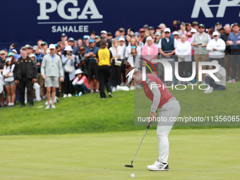 Miyu Yamashita of Japan follows her putt on the 18th green during Day Four of the KPMG Women's PGA Championship at Sahalee Country Club in S...