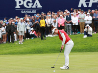 Miyu Yamashita of Japan follows her putt on the 18th green during Day Four of the KPMG Women's PGA Championship at Sahalee Country Club in S...