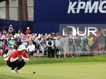 Amy Yang of Republic of Korea lines up her putt on the 18th green during Day Four of the KPMG Women's PGA Championship at Sahalee Country Cl...