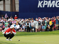 Amy Yang of Republic of Korea lines up her putt on the 18th green during Day Four of the KPMG Women's PGA Championship at Sahalee Country Cl...