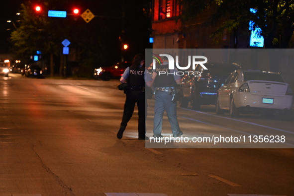 A 24-year-old male victim is being shot multiple times and is in critical condition in Chicago, Illinois, United States, on June 23, 2024. A...