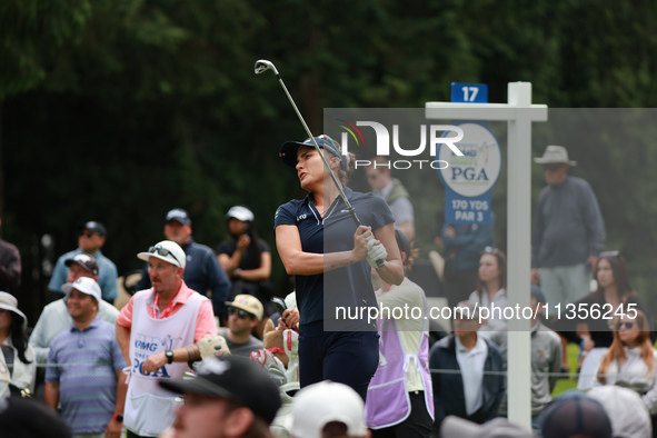 Lexi Thompson of the United States tees off on the 17th hole during Day Four of the KPMG Women's PGA Championship at Sahalee Country Club in...