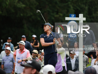 Lexi Thompson of the United States tees off on the 17th hole during Day Four of the KPMG Women's PGA Championship at Sahalee Country Club in...