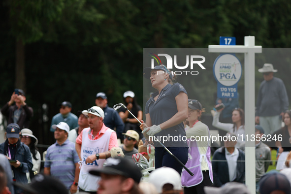 Lexi Thompson of the United States tees off on the 17th hole during Day Four of the KPMG Women's PGA Championship at Sahalee Country Club in...