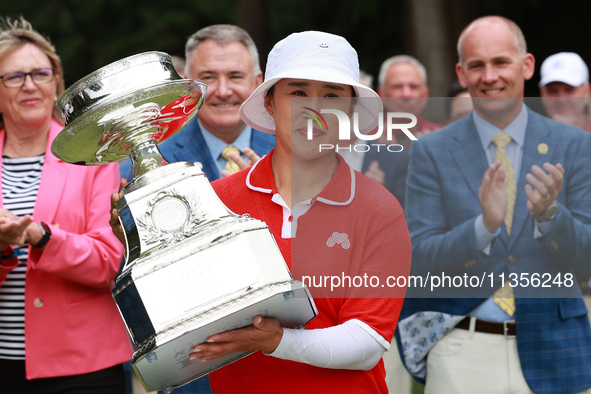 Amy Yang of Republic of Korea holds up the trophy after winning the KPMG Women's PGA Championship at Sahalee Country Club in Sammamish, Wash...