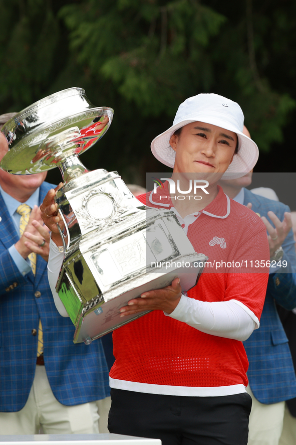 Amy Yang of Republic of Korea holds up the trophy after winning the KPMG Women's PGA Championship at Sahalee Country Club in Sammamish, Wash...