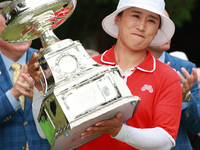 Amy Yang of Republic of Korea holds up the trophy after winning the KPMG Women's PGA Championship at Sahalee Country Club in Sammamish, Wash...