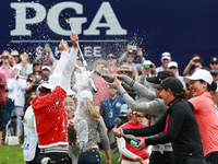 Amy Yang of Republic of Korea is showered with sparkling wine by her peers after winning the KPMG Women's PGA Championship at Sahalee Countr...