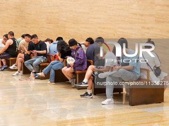 Citizens are enjoying the cool off at Shandong Museum in Jinan, China, on June 23, 2024. (