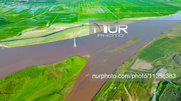 A view is overlooking the Yinchuan section of the Yellow River in Yinchuan, capital of Northwest China's Ningxia Hui autonomous region, in W...