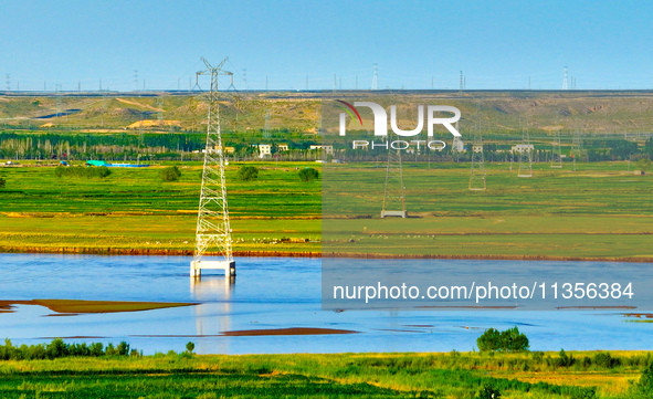 A view is overlooking the Yinchuan section of the Yellow River in Yinchuan, capital of Northwest China's Ningxia Hui autonomous region, in W...