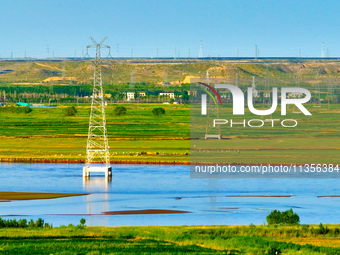 A view is overlooking the Yinchuan section of the Yellow River in Yinchuan, capital of Northwest China's Ningxia Hui autonomous region, in W...