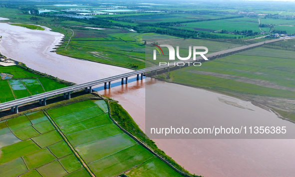 A view is overlooking the Yinchuan section of the Yellow River in Yinchuan, capital of Northwest China's Ningxia Hui autonomous region, in W...