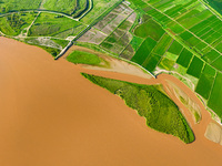 A view is overlooking the Yinchuan section of the Yellow River in Yinchuan, capital of Northwest China's Ningxia Hui autonomous region, in W...