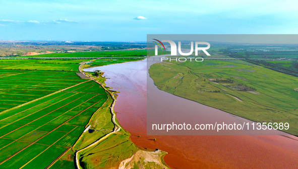 A view is overlooking the Yinchuan section of the Yellow River in Yinchuan, capital of Northwest China's Ningxia Hui autonomous region, in W...