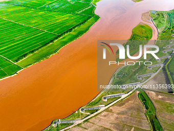 A view is overlooking the Yinchuan section of the Yellow River in Yinchuan, capital of Northwest China's Ningxia Hui autonomous region, in W...