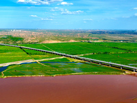 A view is overlooking the Yinchuan section of the Yellow River in Yinchuan, capital of Northwest China's Ningxia Hui autonomous region, in W...