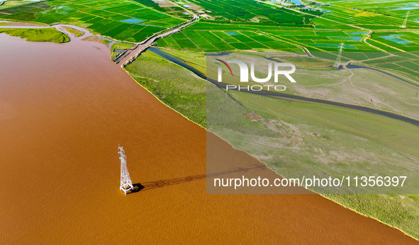 A view is overlooking the Yinchuan section of the Yellow River in Yinchuan, capital of Northwest China's Ningxia Hui autonomous region, in W...