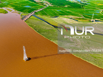 A view is overlooking the Yinchuan section of the Yellow River in Yinchuan, capital of Northwest China's Ningxia Hui autonomous region, in W...