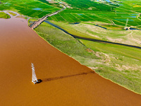 A view is overlooking the Yinchuan section of the Yellow River in Yinchuan, capital of Northwest China's Ningxia Hui autonomous region, in W...