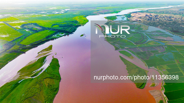 A view is overlooking the Yinchuan section of the Yellow River in Yinchuan, capital of Northwest China's Ningxia Hui autonomous region, in W...