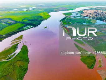 A view is overlooking the Yinchuan section of the Yellow River in Yinchuan, capital of Northwest China's Ningxia Hui autonomous region, in W...