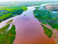 A view is overlooking the Yinchuan section of the Yellow River in Yinchuan, capital of Northwest China's Ningxia Hui autonomous region, in W...