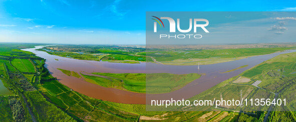 A view is overlooking the Yinchuan section of the Yellow River in Yinchuan, capital of Northwest China's Ningxia Hui autonomous region, in W...