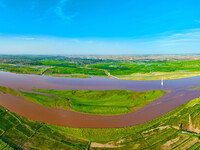 A view is overlooking the Yinchuan section of the Yellow River in Yinchuan, capital of Northwest China's Ningxia Hui autonomous region, in W...