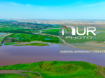 A view is overlooking the Yinchuan section of the Yellow River in Yinchuan, capital of Northwest China's Ningxia Hui autonomous region, in W...