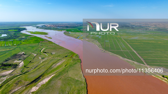 A view is overlooking the Yinchuan section of the Yellow River in Yinchuan, capital of Northwest China's Ningxia Hui autonomous region, in W...