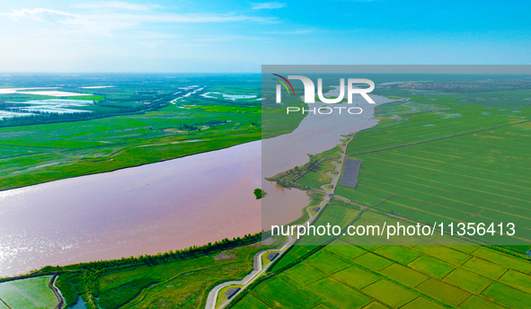 A view is overlooking the Yinchuan section of the Yellow River in Yinchuan, capital of Northwest China's Ningxia Hui autonomous region, in W...