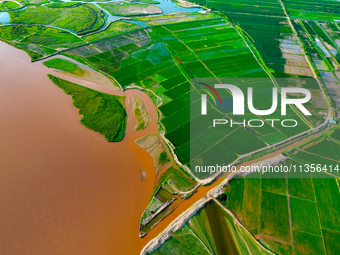 A view is overlooking the Yinchuan section of the Yellow River in Yinchuan, capital of Northwest China's Ningxia Hui autonomous region, in W...