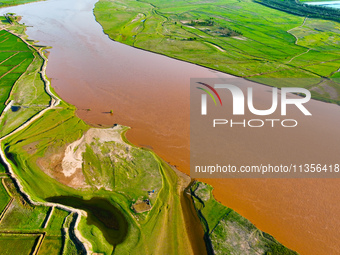 A view is overlooking the Yinchuan section of the Yellow River in Yinchuan, capital of Northwest China's Ningxia Hui autonomous region, in W...