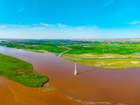 A view is overlooking the Yinchuan section of the Yellow River in Yinchuan, capital of Northwest China's Ningxia Hui autonomous region, in W...