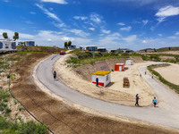 Tourists are playing at the ''space capsule camp'' in Ganjing village, Guyuan city, Northwest China's Ningxia Hui Autonomous region, on June...