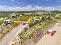 Tourists are playing at the ''space capsule camp'' in Ganjing village, Guyuan city, Northwest China's Ningxia Hui Autonomous region, on June...