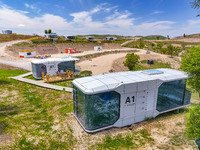 Tourists are playing at the ''space capsule camp'' in Ganjing village, Guyuan city, Northwest China's Ningxia Hui Autonomous region, on June...