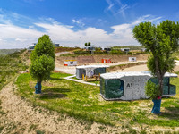 Tourists are playing at the ''space capsule camp'' in Ganjing village, Guyuan city, Northwest China's Ningxia Hui Autonomous region, on June...