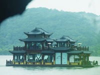 Tourists are braving the rain on the West Lake in Hangzhou, China, on June 24, 2024. On the same day, the National Meteorological Center is...