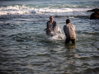 Displaced Palestinians are being seen on the beach in Deir el-Balah in the central Gaza Strip on June 24, 2024, amid the ongoing conflict be...