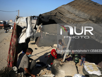 Displaced Palestinians are baking bread in Deir el-Balah, in the central Gaza Strip, on June 24, 2024, amid the ongoing conflict between Isr...