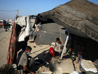 Displaced Palestinians are baking bread in Deir el-Balah, in the central Gaza Strip, on June 24, 2024, amid the ongoing conflict between Isr...