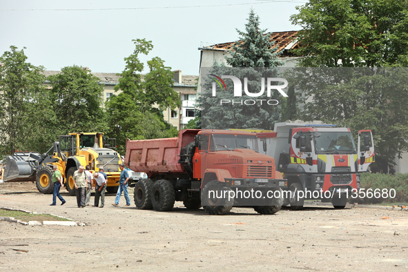 Trucks are being pictured at the Ivano-Frankivsk National Technical University of Oil and Gas, damaged by a Russian missile attack, in Ivano...