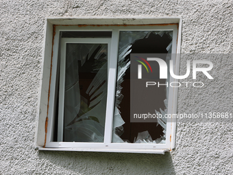 A broken window is being pictured at the Ivano-Frankivsk National Technical University of Oil and Gas, damaged by a Russian missile attack,...