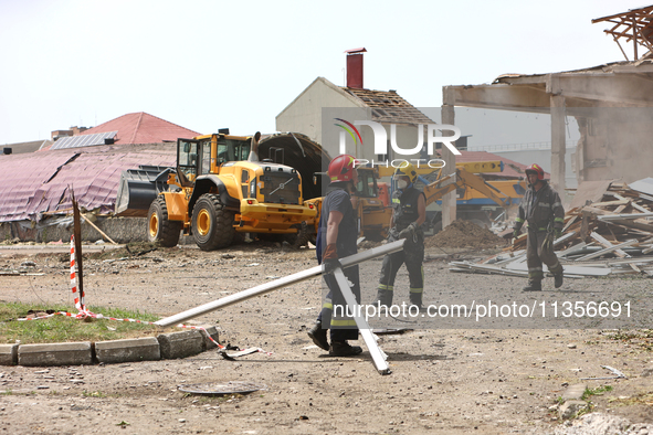 Rescuers are removing the rubble at the Ivano-Frankivsk National Technical University of Oil and Gas damaged by a Russian missile attack in...